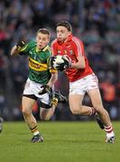 6 April 2011; Mark Collins, Cork, in action against Peter Crowley, Kerry. Cadbury Munster GAA Football Under 21 Championship Final, Cork v Kerry, Pairc Ui Rinn, Cork. Picture credit: Diarmuid Greene / SPORTSFILE