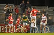 6 April 2011; Cork players, from left, Damien Cahalane, Peter Daly and Liam Jennings, celebrate around Kerry's Paul Geaney after he missed a penalty in the final minute of the game. Cadbury Munster GAA Football Under 21 Championship Final, Cork v Kerry, Pairc Ui Rinn, Cork. Picture credit: Diarmuid Greene / SPORTSFILE