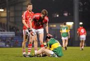6 April 2011; Mark Griffin, Kerry, gets a sporting pat on the head from Donal Og Hodnett, Cork. Cadbury Munster GAA Football Under 21 Championship Final, Cork v Kerry, Pairc Ui Rinn, Cork. Picture credit: Diarmuid Greene / SPORTSFILE