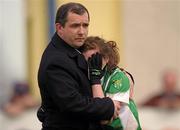9 April 2011; Meath football manager Seamus McEnaney consoles his daughter and captain of St Louis, Carrickmacross, Laura McEnaney, after the game. Tesco All Ireland Ladies Football Post Primary Senior C Championship Final, Loretto, Clonmel, Co. Tipperary v St Louis, Carrickmacross, Co. Monaghan, Clan na nGael, Johnstown, Athlone, Co. Roscommon. Photo by Sportsfile