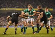 19 November 2016; Andrew Trimble of Ireland is tackled by Ardie Savea of New Zealand during the Autumn International match between Ireland and New Zealand at the Aviva Stadium in Dublin. Photo by Ramsey Cardy/Sportsfile