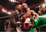 19 November 2016; UFC Lightweight and Featherweight champion Conor McGregor celebrates with fellow SBG gym fighter Artem Lobov after his victory over Teruto Ishihara in their Featherweight bout at UFC Fight Night 99 in the SSE Arena, Belfast. Photo by David Fitzgerald/Sportsfile