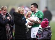 20 November 2016; John Doran of St. Mullins holds baby Jennifer Foley, age 4 weeks, at the end of the AIB Leinster GAA Hurling Senior Club Championship semi-final match between St. Mullins and Cuala at Netwatch Cullen Park in Carlow. Photo by David Maher/Sportsfile