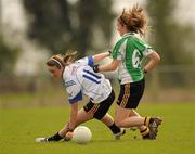 9 April 2011; Tessa Mullins, Holy Rosary, Mountbellew, in action against Sadhb ni Dhochartaigh, Colaiste Íosagáin, Stillorgan. Tesco All Ireland Ladies Football Post Primary Senior B Championship Final, Holy Rosary, Mountbellew, Co. Galway v Colaiste Íosagáin, Stillorgan, Co. Dublin, Clan na nGael, Johnstown, Athlone, Co. Roscommon. Photo by Sportsfile