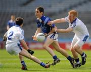 9 April 2011; Ian Burke, St Jarlaths, Tuam, in action against Darryl Brannigan, left, and Eamonn Magee, St Colmans, Newry. All-Ireland Colleges Senior A Football Championship Final, St Colmans, Newry, Co. Down v St Jarlaths, Tuam, Co. Galway, Croke Park, Dublin. Picture credit: Oliver McVeigh / SPORTSFILE
