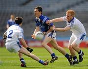 9 April 2011; Ian Burke, St Jarlaths, Tuam, in action against Darryl Brannigan, left, and Eamonn Magee, St Colmans, Newry. All-Ireland Colleges Senior A Football Championship Final, St Colmans, Newry, Co. Down v St Jarlaths, Tuam, Co. Galway, Croke Park, Dublin. Picture credit: Oliver McVeigh / SPORTSFILE