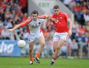 10 April 2011; Brendan Donaghy, Armagh, in action against Daniel Goulding, Cork. Allianz Football League, Division 1, Round 7, Cork v Armagh, Pairc Ui Chaoimh, Cork. Picture credit: Barry Cregg / SPORTSFILE