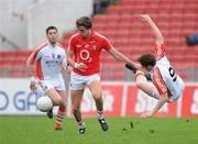 10 April 2011; Aidan Walsh, Cork, fouls Charlie Vernon, Armagh while contesting for the ball. Allianz Football League, Division 1, Round 7, Cork v Armagh, Pairc Ui Chaoimh, Cork. Picture credit: Barry Cregg / SPORTSFILE