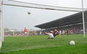 10 April 2011; Donncha O'Connor, Cork, scores a penalty against Armagh goalkeeper Paul Hearty to score his side's first goal. Allianz Football League, Division 1, Round 7, Cork v Armagh, Pairc Ui Chaoimh, Cork. Picture credit: Barry Cregg / SPORTSFILE