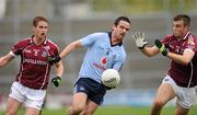 10 April 2011; Ger Brennan, Dublin, in action against Gary O'Donnell, left, and Paul Conroy, Galway. Allianz Football League, Division 1, Round 7, Galway v Dublin, Pearse Stadium, Salthill, Galway. Picture credit: Ray McManus / SPORTSFILE