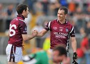 10 April 2011;  Westmeath players Dessie Dolan, right, and Fergal Wilson, celebrate at the end of the game after victory over Offaly. Allianz Football League, Division 2, Round 7, Westmeath v Offaly, Cusack Park, Mullingar, Co. Westmeath. Picture credit: David Maher / SPORTSFILE