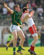 10 April 2011; Conor Gormley, Tyrone, in action against Nigel Crawford, Meath. Allianz Football League, Division 2, Round 7, Meath v Tyrone, Pairc Tailteann, Navan, Co. Meath. Photo by Sportsfile