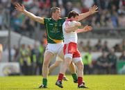 10 April 2011; Conor Gormley, Tyrone, in action against Nigel Crawford, Meath. Allianz Football League, Division 2, Round 7, Meath v Tyrone, Pairc Tailteann, Navan, Co. Meath. Photo by Sportsfile