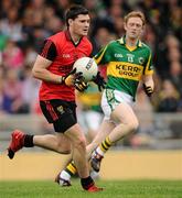 10 April 2011; Martin Clarke, Down, in action against Colm Cooper, Kerry. Allianz Football League, Division 1, Round 7, Kerry v Down, Fitzgerald Stadium, Killarney, Co. Kerry. Picture credit: Brendan Moran / SPORTSFILE