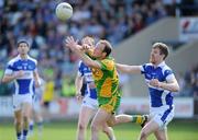 10 April 2011; Colm McFadden, Donegal , in action against Denis Booth, Laois. Allianz Football League, Division 2, Round 7, Laois v Donegal, O'Moore Park, Portlaoise, Co. Laois. Picture credit: Matt Browne / SPORTSFILE
