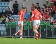 10 April 2011; Eoin Cadogan, Cork, walks off the field past team-mate Fintan Goold, right, after being shown a red card. Allianz Football League, Division 1, Round 7, Cork v Armagh, Pairc Ui Chaoimh, Cork. Picture credit: Barry Cregg / SPORTSFILE