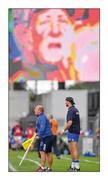 24 July 2016; Looking over your shoulder. Brian Cody appears on the Semple Stadium screen while Waterford manager Derek McGrath and selector Dan Shanahan direct their team’s win over Wexford in the qualifiers  Photo by Stephen McCarthy/Sportsfile  This image may be reproduced free of charge when used in conjunction with a review of the book &quot;A Season of Sundays 2016&quot;. All other usage © SPORTSFILE