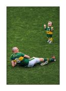 28 August 2016; Keeping things in perspective. Kerry’s Kieran Donaghy plays with his daughter Lola Rose on the Croke Park pitch following his county’s exit to Dublin. Will he be back?  Photo by Dáire Brennan/Sportsfile  This image may be reproduced free of charge when used in conjunction with a review of the book &quot;A Season of Sundays 2016&quot;. All other usage © SPORTSFILE