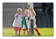 2 July 2016; Ensnared, for the moment. Three youngsters from Dromahair in Leitrim, from left, Luke Cranley, Alex Leyden and Darren Kelly, await their turn to display their football skills at half-time in Markievicz Park  Photo by Ray Ryan/Sportsfile  This image may be reproduced free of charge when used in conjunction with a review of the book &quot;A Season of Sundays 2016&quot;. All other usage © SPORTSFILE