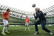 23 November 2016; At the announcement of Aviva’s sponsorship of the FAI’s Soccer Sisters programme from 2017 – 2020 in Aviva Stadium, Dublin, are Republic of Ireland's Stephanie Roche playing with Danielle Holmes, left, age 11, and Abbey Larkin, age 11. Aviva’s sponsorship of the programme will see an expansion to a planned 120 venues across Ireland in 2017 along with an Aviva Soccer Sisters Schools programme and an Aviva Soccer Sisters Nursery Academy which will target girls between 5 and 8 years old.  Pre-registration is open now at www.fai.ie/soccersisters or if you are interested in hosting an Aviva Soccer Sisters camp in 2017 contact soccersisters@fai.ie #AvivaSoccerSisters. Photo by Cody Glenn/Sportsfile