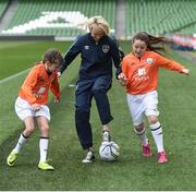 23 November 2016; At the announcement of Aviva’s sponsorship of the FAI’s Soccer Sisters programme from 2017 – 2020 in Aviva Stadium, Dublin, is Republic of Ireland's Stephanie Roche plays againsts Abbey Larkin, left, age 11, from Ringsend, Dublin, and Holly Kelly, age 9, from Pearse Street, Dublin. Aviva’s sponsorship of the programme will see an expansion to a planned 120 venues across Ireland in 2017 along with an Aviva Soccer Sisters Schools programme and an Aviva Soccer Sisters Nursery Academy which will target girls between 5 and 8 years old.  Pre-registration is open now at www.fai.ie/soccersisters or if you are interested in hosting an Aviva Soccer Sisters camp in 2017 contact soccersisters@fai.ie #AvivaSoccerSisters. Photo by Cody Glenn/Sportsfile