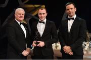 3 November 2017; Down hurler Eoghan Sands is presented with his Christy Ring Champion 15 award by Uachtarán Chumann Lúthchleas Gael Aogán Ó Fearghail, left, and David Collins, GPA President, during the PwC All Stars 2017 at the Convention Centre in Dublin. Photo by Piaras Ó Mídheach/Sportsfile