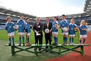 12 April 2011; The 2011 Vhi GAA Cúl Camps were officially launched this morning in Croke Park by Uachtarán Chumann Lúthchleas Gael Criostóir Ó Cuana and Declan Moran of Vhi Healthcare. With over 1,000 camps taking place in Ireland and overseas, and over 83,000 children aged 6-14 years participating, the Vhi GAA Cúl Camps are the most popular children’s sporting camps in the country. Pictured in attendance are Uachtarán Chumann Lúthchleas Gael Criostóir Ó Cuana, Declan Moran, Director, Marketing And Business Development, Vhi Heathcare, with children from left to right, Conor O'Driscoll, age 7, Meath, Charlie McCarthy, age 8, Dublin, Kate McCarthy, age 6, Dublin, Mollie Lennon, age 6, Kilkenny, Stephen Carey, age 8, Kildare, Aoibheann Collins, age 7, Limerick and Aoife Donovan, age 6, Dublin. Vhi GAA Cúl Camps Ambassador Launch 2011, Croke Park, Dublin. Picture credit: David Maher / SPORTSFILE