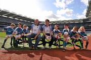 12 April 2011; The 2011 Vhi GAA Cúl Camps were officially launched this morning in Croke Park by Uachtarán Chumann Lúthchleas Gael Criostóir Ó Cuana and Declan Moran of Vhi Healthcare. With over 1,000 camps taking place in Ireland and overseas, and over 83,000 children aged 6-14 years participating, the Vhi GAA Cúl Camps are the most popular children’s sporting camps in the country. Pictured in attendance are Dublin hurling manager Anthony Daly, left, and Kildare football manager Kieran McGeeney, with children, from left to right, Conor O'Driscoll, age 7, Meath, Charlie McCarthy, age 8, Dublin, Kate McCarthy, age 6, Dublin, Mollie Lennon, age 6, Kilkenny, Stephen Carey, age 8, Kildare, Aoibheann Collins, age 7, Limerick, and Aoife Donovan, age 6, Dublin. Vhi GAA Cúl Camps Ambassador Launch 2011, Croke Park, Dublin. Picture credit: David Maher / SPORTSFILE