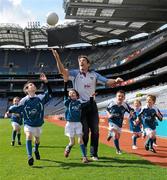 12 April 2011; The 2011 Vhi GAA Cúl Camps were officially launched this morning in Croke Park by Uachtarán Chumann Lúthchleas Gael Criostóir Ó Cuana and Declan Moran of Vhi Healthcare. With over 1,000 camps taking place in Ireland and overseas, and over 83,000 children aged 6 – 14 years participating, the Vhi GAA Cúl Camps are the most popular children’s sporting camps in the country. Pictured in attendance are Kildare manager Kieran Mcgeeney with from left, Mollie Lennon aged 6, from Kilkenny Charlie McCarthy aged 8, from Dublin, Kate McCarthy aged 6, from Dublin, Stephen Carey aged 8, from Kildare, Aoibheann Collins aged 7, from Limerick and Conor O'Driscoll aged 7, from Meath. Vhi GAA Cúl Camps Ambassador Launch 2011, Croke Park, Dublin. Picture credit: Barry Cregg / SPORTSFILE