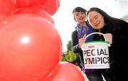 15 April 2011; Special Olympics collector Mei Lin Yap, from Goatstown, Dublin, with her friend Aine Naughton, from Ballygar, Galway, during the Special Olympics Ireland’s annual collection day. This is the biggest annual fundraising event in aid of Special Olympics Ireland. Grafton Street, Dublin. Picture credit: Brian Lawless / SPORTSFILE