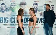 25 November 2016; Katie Taylor and Karina Kopinska square off, in the company of promoter Eddie Hearn, during the official weigh-in at the Hilton London Wembley Hotel prior to the Big City Dreams boxing event at the Wembley Arena in London, England. Photo by Stephen McCarthy/Sportsfile