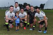25 November 2016; Two year old Senan Morris, from Raheny, Dublin, but resident with his parents in Abu Dhabi, with Dublin players Brian Fenton, Philly McMahon, Bernard Brogan, Ciaran Kilkenny and Cian O'Sullivan after the GAA GPA All-Stars football tour sponsored by Opel game at the Sheikh Zayed Sports City Stadium in Abu Dhabi, United Arab Emirates. Photo by Ray McManus/Sportsfile