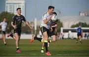 25 November 2016; Bernard Brogan, Dublin, of the 2016 All Stars in action against Michael Quinlivan, Tipperary, of the 2015 All Stars during the GAA GPA All-Stars football tour sponsored by Opel at the Sheikh Zayed Sports City Stadium in Abu Dhabi, United Arab Emirates. Photo by Ray McManus/Sportsfile