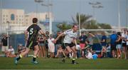 25 November 2016; Neil Gallagher, Donegal, of the 2016 All Stars in action against Robbie Kiely, Tipperary, of the 2015 All Stars during the GAA GPA All-Stars football tour sponsored by Opel at the Sheikh Zayed Sports City Stadium in Abu Dhabi, United Arab Emirates. Photo by Ray McManus/Sportsfile