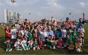 25 November 2016; A group of children, who had played in games earlier, with Uachtarán Chumann Lúthchleas Aogán Ó Fearghail and the Sam Maguire Cup prior to the the GAA GPA All-Stars football tour sponsored by Opel at the Sheikh Zayed Sports City Stadium in Abu Dhabi, United Arab Emirates. Photo by Ray McManus/Sportsfile