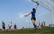 25 November 2016; Michael Murphy, Donegal, of the 2016 All Stars looks on as his shot is punched over the bar by the 2015 All Stars goalkeeper David Clarke, Mayo, during the GAA GPA All-Stars football tour sponsored by Opel at the Sheikh Zayed Sports City Stadium in Abu Dhabi, United Arab Emirates. Photo by Ray McManus/Sportsfile
