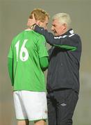 29 March 2011; Northern Ireland manager Nigel Worthington with Liam Boyce after the game. EURO2012 Championship Qualifier, Northern Ireland v Slovenia, Windsor Park, Belfast, Co. Antrim. Picture credit: Oliver McVeigh / SPORTSFILE