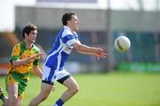 10 April 2011; Niall Donoher, Laois, in action against Marty Boyle, Donegal. Allianz Football League, Division 2, Round 7, Laois v Donegal, O'Moore Park, Portlaoise, Co. Laois. Picture credit: Matt Browne / SPORTSFILE