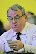 16 April 2011; Former GAA President Nickey Brennan uses a GOinteractive TurningPoint ResponseCard to indicate his preference during an electronic vote on a motion during the GAA Annual Congress 2011. Mullingar Park Hotel, Mullingar, Co. Westmeath. Picture credit: Ray McManus / SPORTSFILE