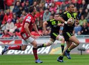 16 April 2011; Munster's Simon Zebo bursts through the Scarlets defence. Celtic League, Scarlets v Munster, Parc Y Scarlets, Llanelli, Wales. Picture credit: Ian Cook / SPORTSFILE