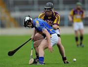 17 April 2011; John Coghlan, Tipperary, in action against P.J. Nolan, Wexford. Allianz Hurling League, Division 1, Round 7, Tipperary v Wexford, Semple Stadium, Thurles, Co. Tipperary. Picture credit: Brian Lawless / SPORTSFILE