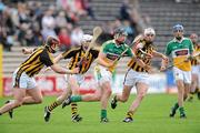 17 April 2011; Derek Molloy, Offaly, in action against Kilkenny players from left, Jackie Tyrrell, TJ Reid and Michael Fennelly. Allianz Hurling League, Division 1, Round 7, Kilkenny v Offaly, Nowlan Park, Kilkenny. Picture credit: Matt Browne / SPORTSFILE
