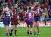 17 April 2011; Wexford's Noeleen Lambert, right, and Kate Kelly celebrate at the final whistle as their team-mate Katrina Parrock shakes hands with Galway's Emer Haverty. Irish Daily Star Camogie League, Division 1, Final, Galway v Wexford, Semple Stadium, Thurles, Co. Tipperary. Picture credit: Brian Lawless / SPORTSFILE