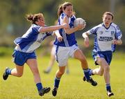 17 April 2011; Sinead Doogue, Laois, in action against Jane Moore, left, and Sharon Courtney, Monaghan. Bord Gais Energy National Football League, Division One, Semi-Final, Monaghan v Laois, Ballymahon, Longford. Photo by Sportsfile