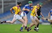 17 April 2011; Noel McGrath, Tipperary, in action against Harry Kehoe and Darren Stamp, left, Wexford. Allianz Hurling League, Division 1, Round 7, Tipperary v Wexford, Semple Stadium, Thurles, Co. Tipperary. Picture credit: Brian Lawless / SPORTSFILE