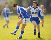 17 April 2011; Tracey lawlor, Laois, in action against Margaret Treanor, Monaghan. Bord Gais Energy National Football League, Division One, Semi-Final, Monaghan v Laois, Ballymahon, Longford. Photo by Sportsfile