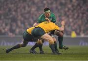 26 November 2016; CJ Stander of Ireland is tackled by David Pocock and Dean Mumm of Australia during the Autumn International match between Ireland and Australia at the Aviva Stadium in Dublin. Photo by Brendan Moran/Sportsfile