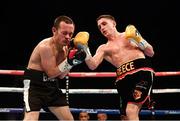 26 November 2016; Ian Bailey receives a right from Reece Bellotti during their Eliminator for English Featherweight Championship fight at Wembley Arena in London, England. Photo by Stephen McCarthy/Sportsfile