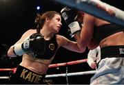 26 November 2016; Katie Taylor, left, exchanges punches with Karina Kopinska during their Super-Featherweight fight at Wembley Arena in London, England. Photo by Stephen McCarthy/Sportsfile