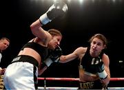 26 November 2016; Katie Taylor, right, exchanges punches with Karina Kopinska during their Super-Featherweight fight at Wembley Arena in London, England. Photo by Stephen McCarthy/Sportsfile